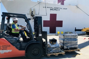 USNS Mercy (T-AH 19) takes on supplies for COVID-19 support.