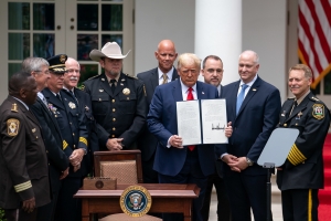 President Donald J. Trump signs an executive order on safe policing for safe communities Tuesday, June 16, 2020