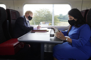 Boris Johnson Prime Minister and Priti Patel Home Secretary working on the Train 30 July 2020