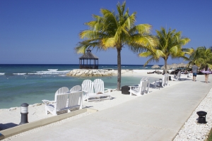 Blue skies, white sand, palm trees