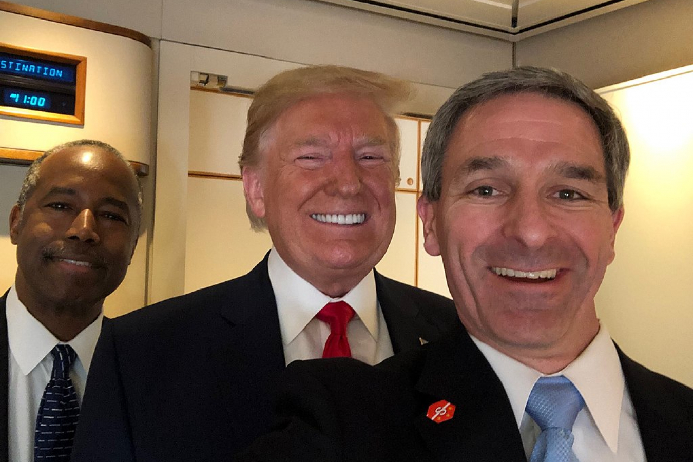 Ken Cuccinelli acting director of USCIS with Trump and Carson