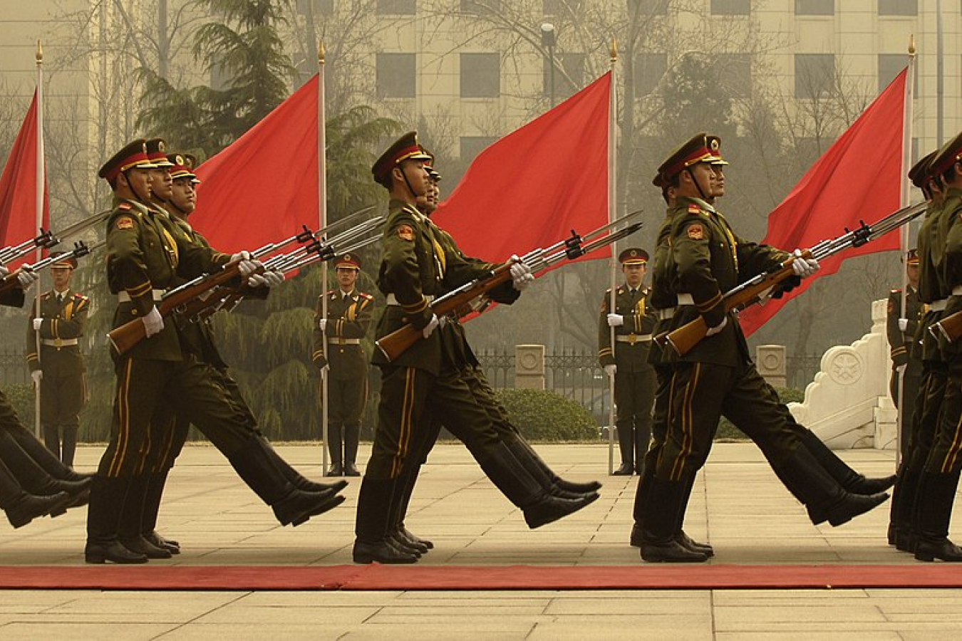 Chinese military honor guard march during a welcome ceremony for Chairman of the Joint Chiefs of Staff Marine Gen. Peter Pace, Beijing, China 22 March 2007