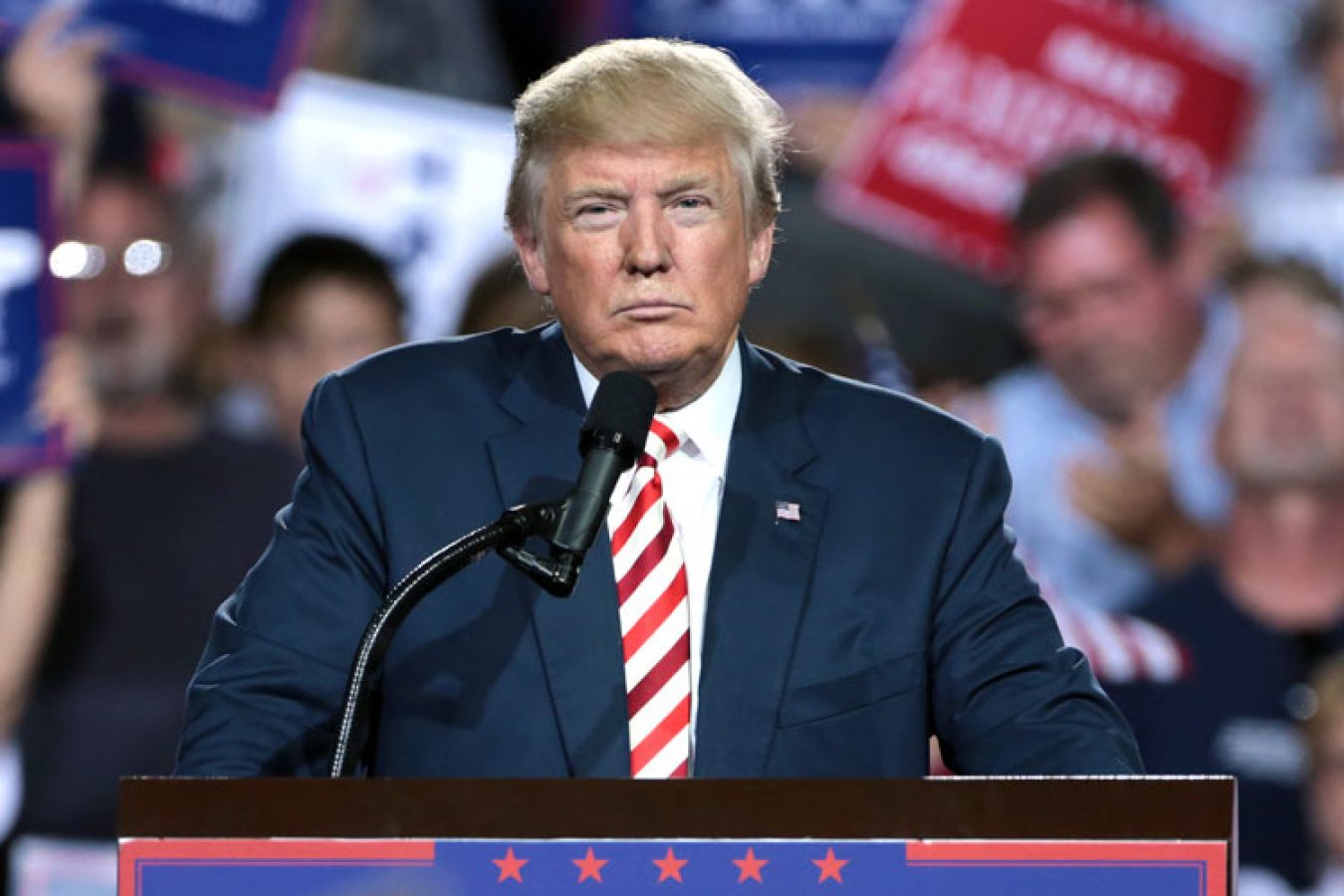 Donald Trump speaking with supporters at a campaign rally